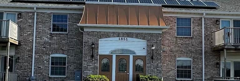 Exterior view of Cambridge Place Apartments, one of the top Iowa City apartment complexes.